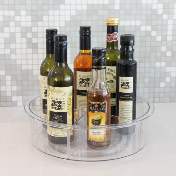 Kitchen storage turntable with various sauces and drinks inside