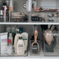 makeup and beauty products in labeled containers in bathroom cupboard